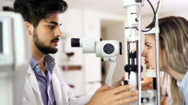 Health care, people, eyesight and technology concept