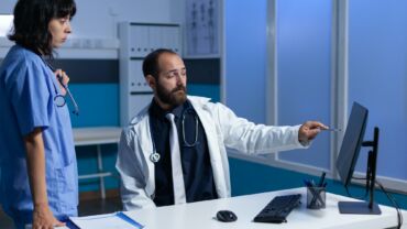 Medical team working with computer for treatment and healthcare