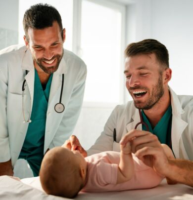 Pediatrician doctor examines baby. Healthcare, people, examination concept